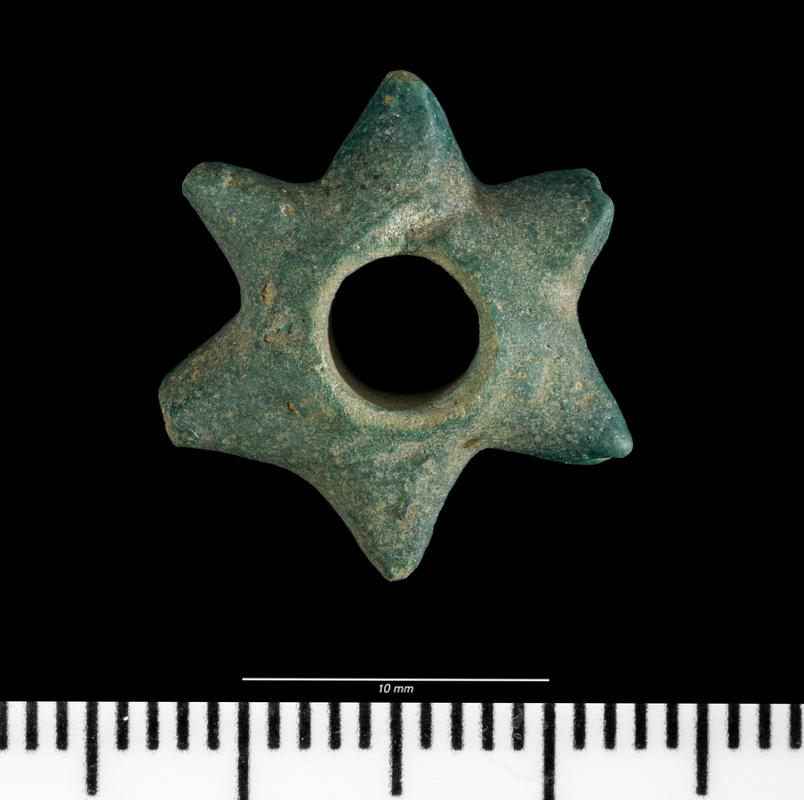 Star Shaped, Faience bead from The Breiddin hillfort