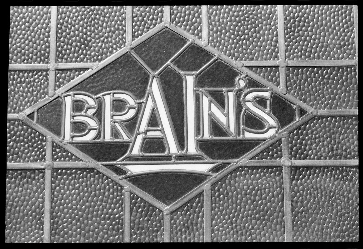 Brain's Brewery sign, in glass window of "The Packet".