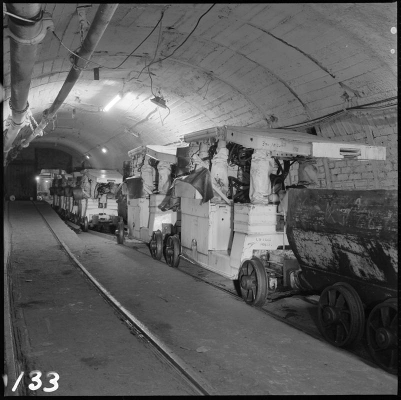 Black and white film negative showing reconditioned Gullick Dobson chocks waiting to be taken inbye, Nantgarw Colliery 1977.  'Nantgarw' is transcribed from original negative bag.  Appears to be identical to 2009.3/95.