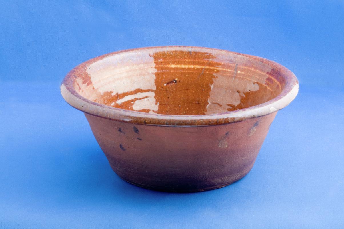 Earthenware brown bowl