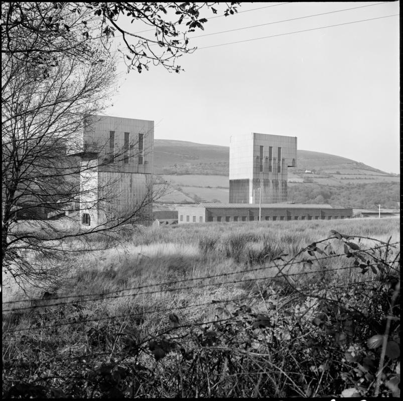 Black and white film negative showing a surface view of Abernant Colliery, 1980.  'Abernant' is transcribed from original negative bag.