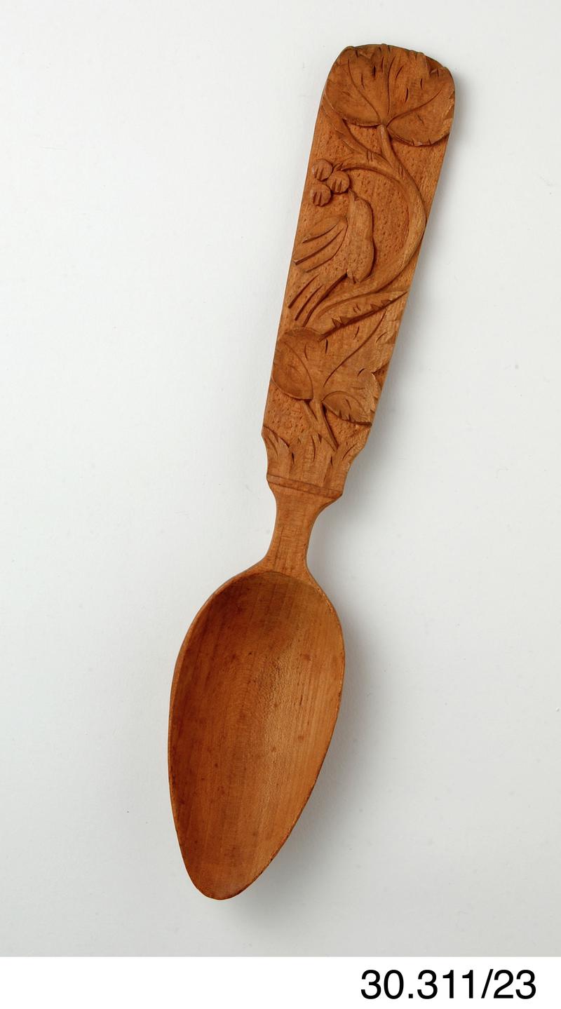 Carved spoon, part of set