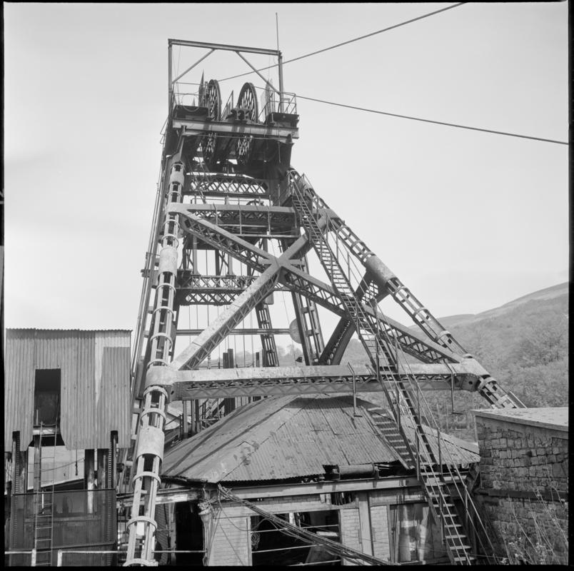 Black and white film negative of a photograph showing the downcast headgear, Deep Duffryn Colliery 19 May 1977.  'Deep Dyffrun 19 May 1977' is transcribed from original negative bag.