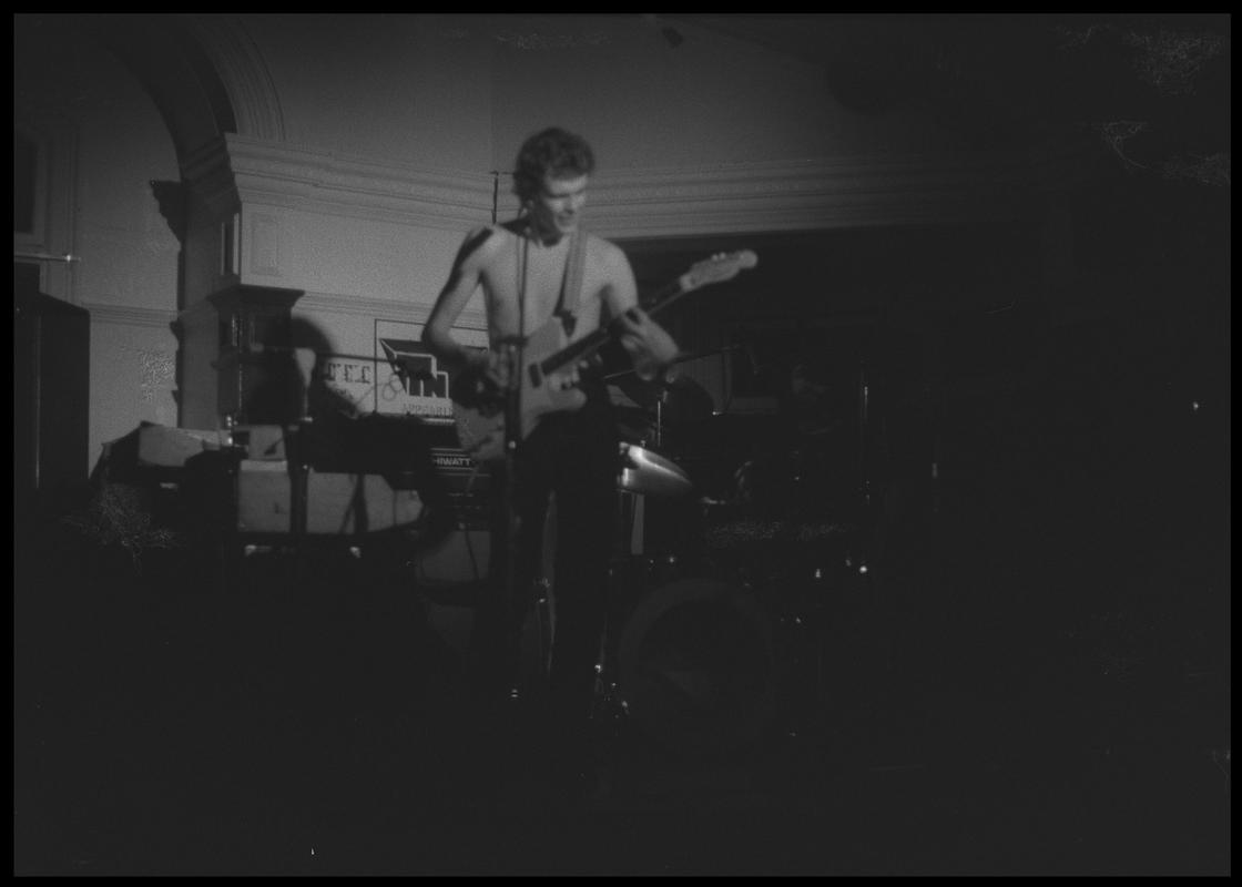 Guitarist, from TNT Group on stage. Location unknown.