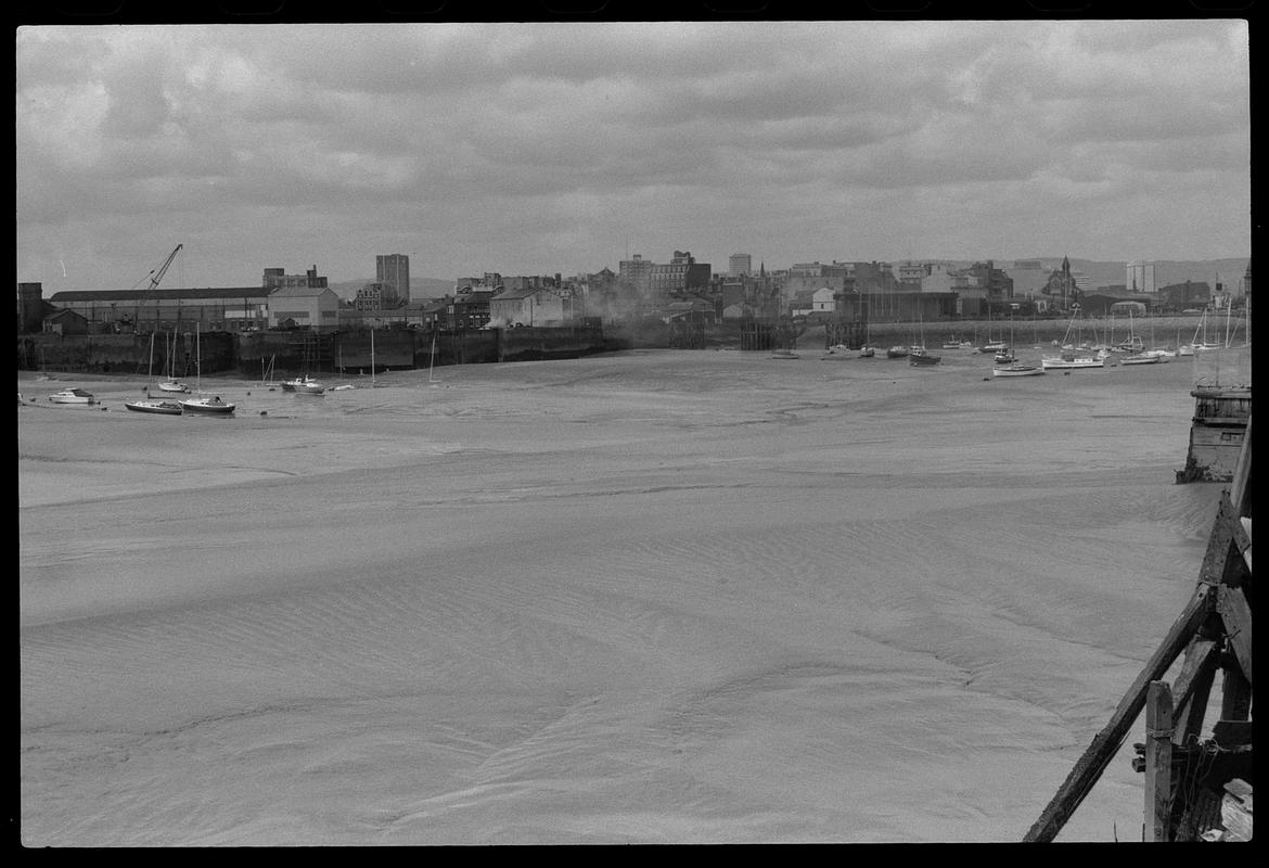 View across Cardiff Bay to the Welsh Industrial and Maritime Museum and Dry Docks, from west side of Queen Alexandra Dock.