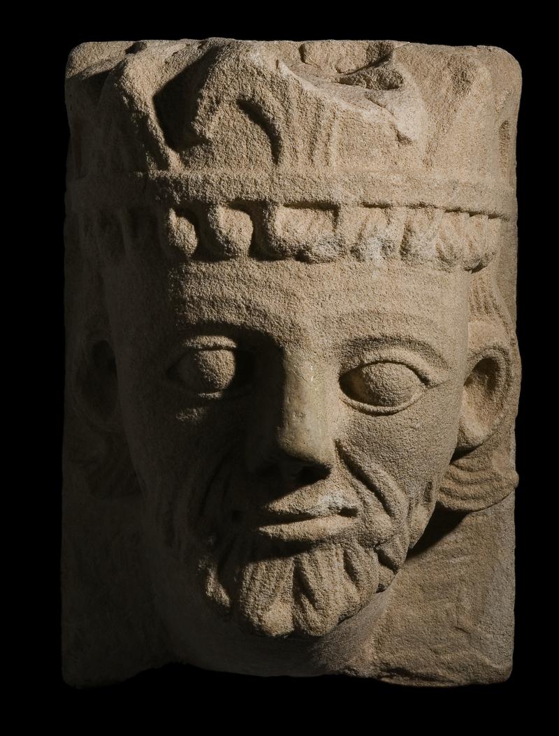 Medieval stone carved head