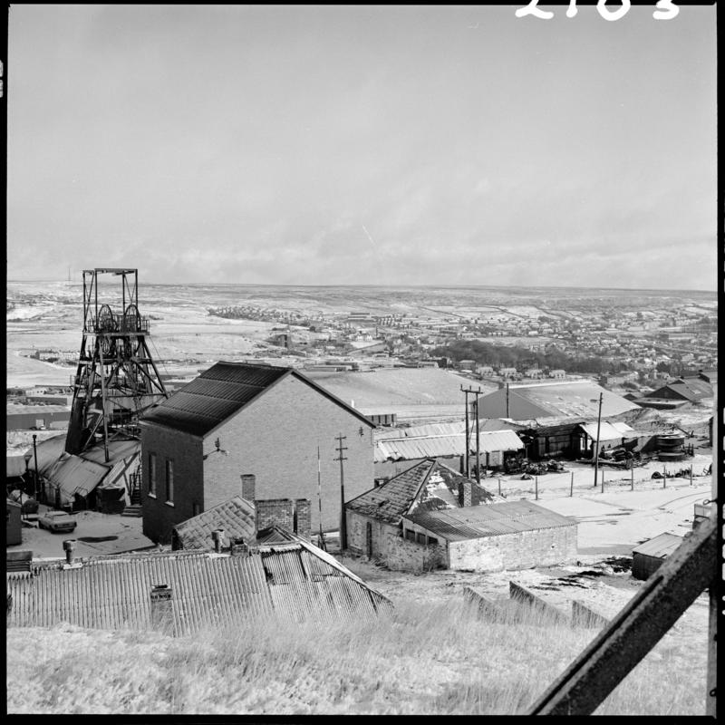 Black and white film negative showing a surface view of Big Pit Colliery, taken from the pit head baths, 28 November 1980.  'Blaenavon 28/11/80' is transcribed from original negative bag.