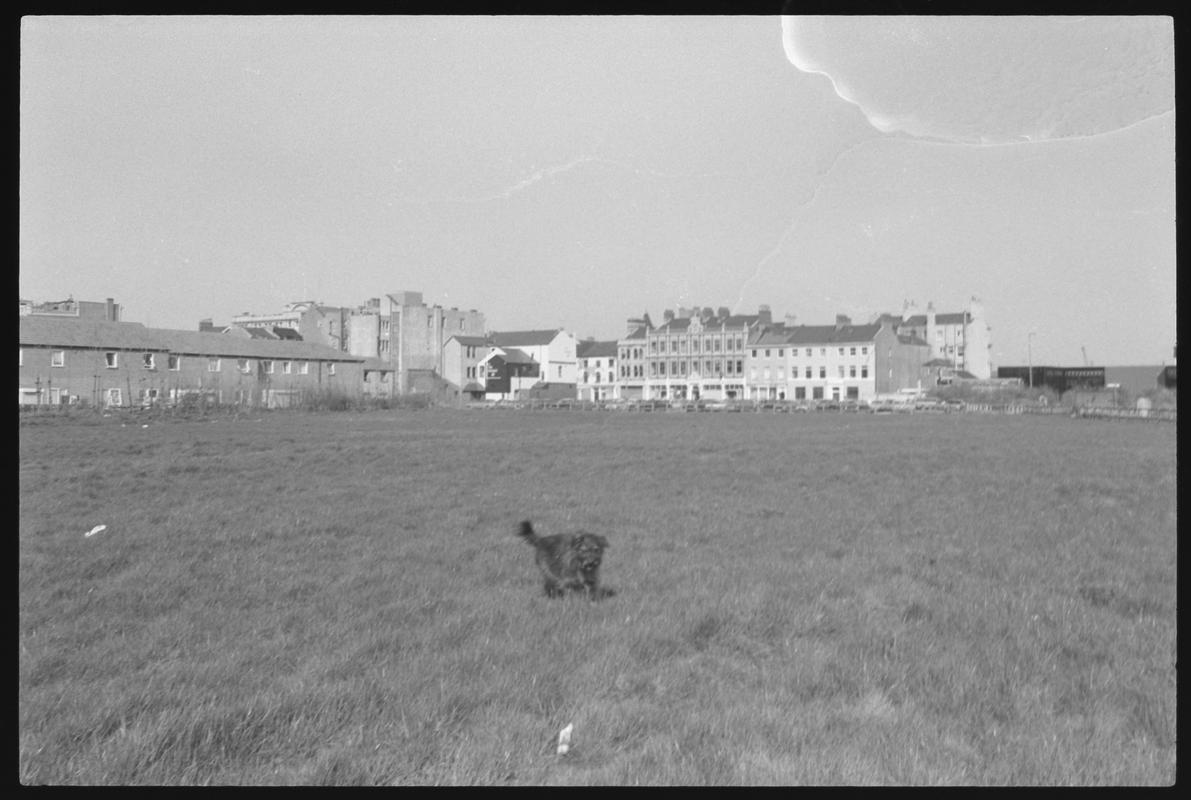 View across waste ground to Bute Street and the Welsh Industrial and Maritime Museum building. Site of proposed new road.