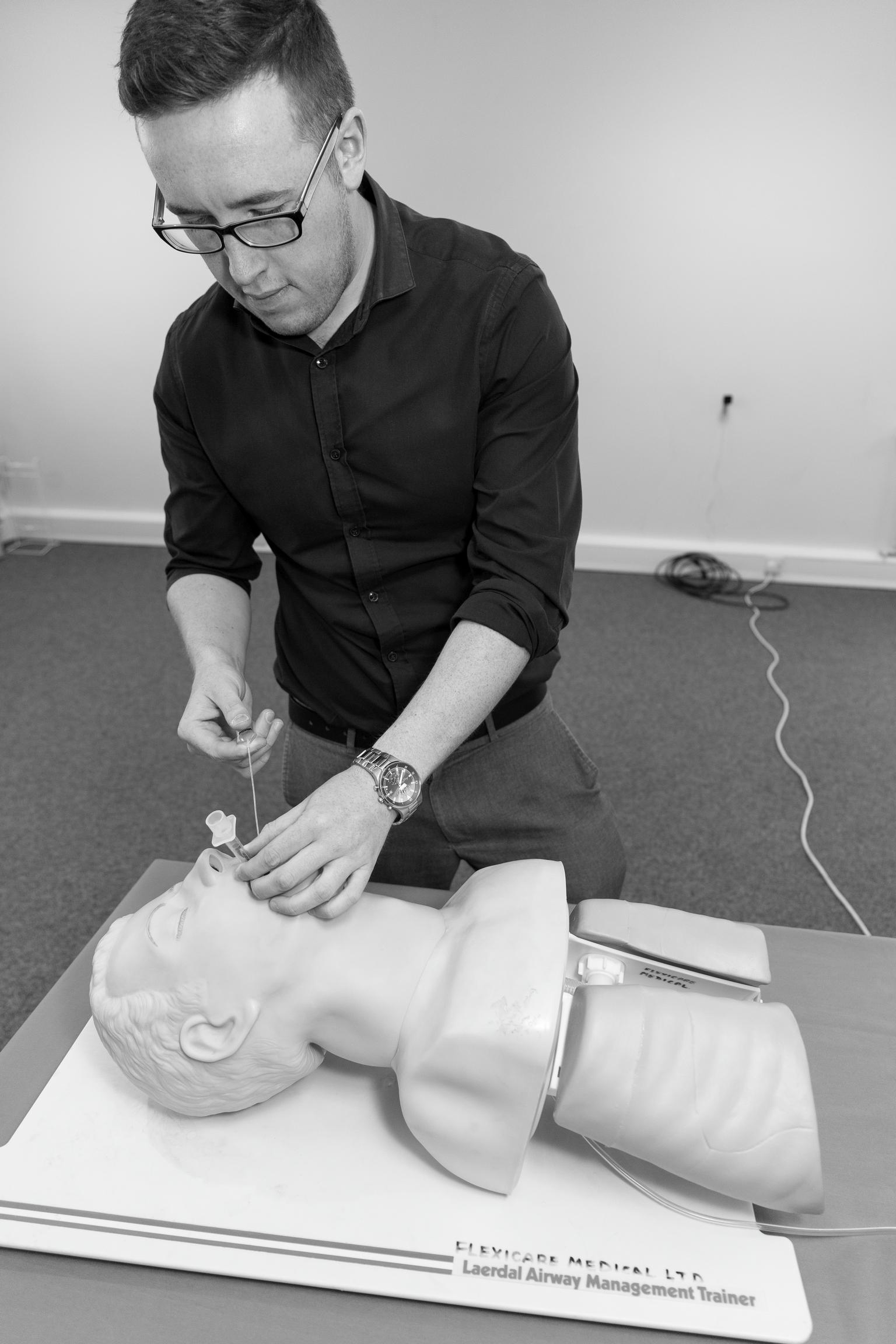 Flexicare medical products. Jordan Thorne demonstrating an Endotracheal tube on dummy. Mountain Ash, Wales