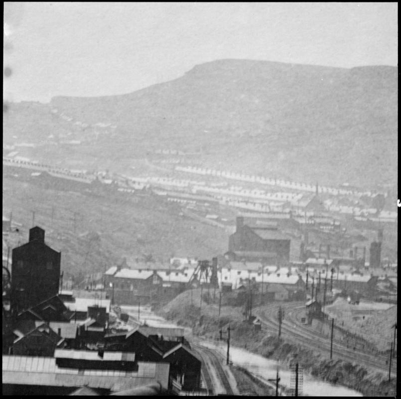 Black and white film negative showing a view looking down towards Lewis Merthyr Colliery.