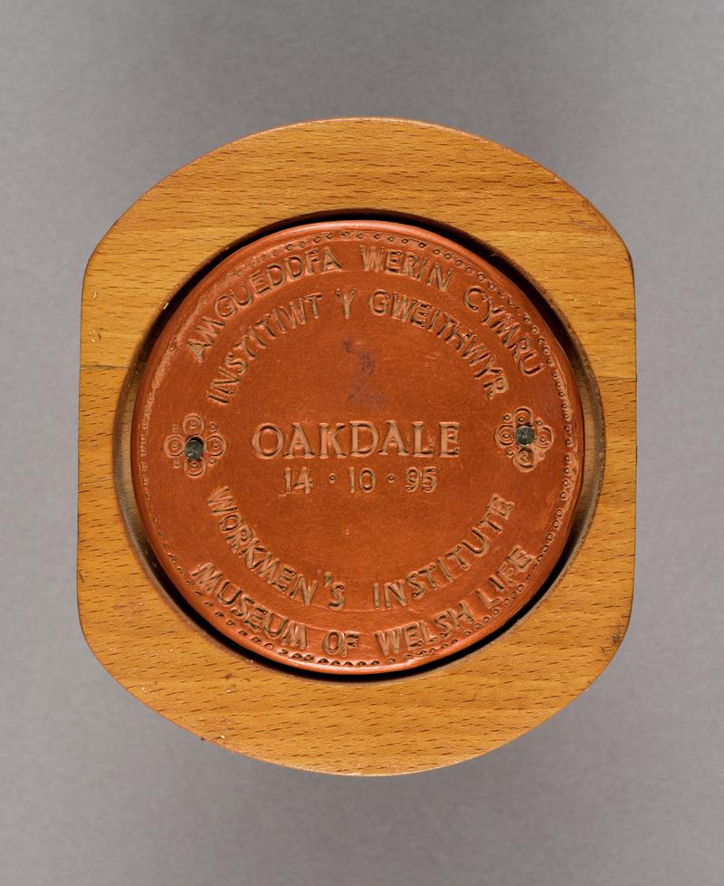 Plaque produced to commemorate the opening of Oakdale Workmen's Institute at the Museum on 14 October 1995.