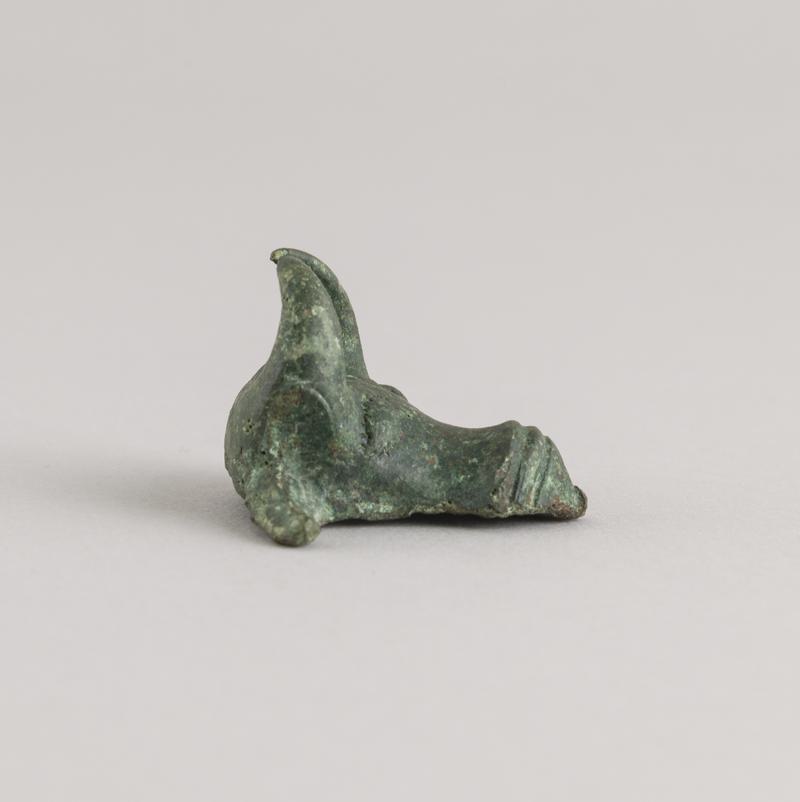 Roman copper alloy ox head escutcheon
