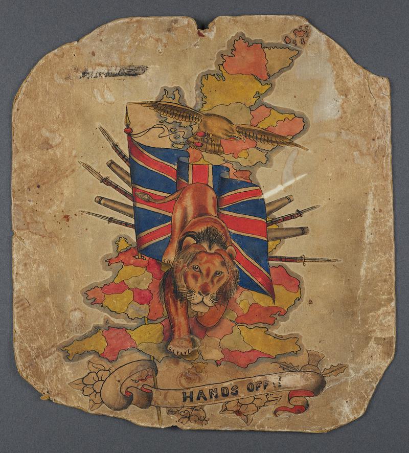 Tattoo flash on card depicting a lion, Union Jack and eagle on a map of Great Britain and the text ‘HANDS OFF’