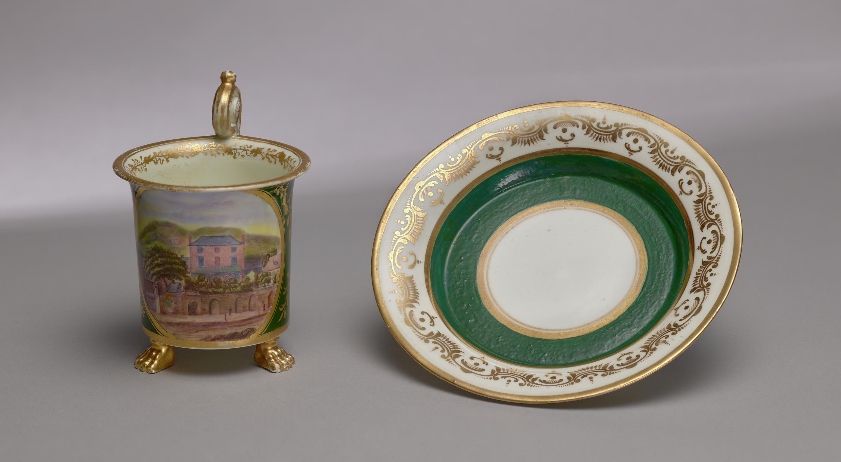 Cup, cabinet and saucer