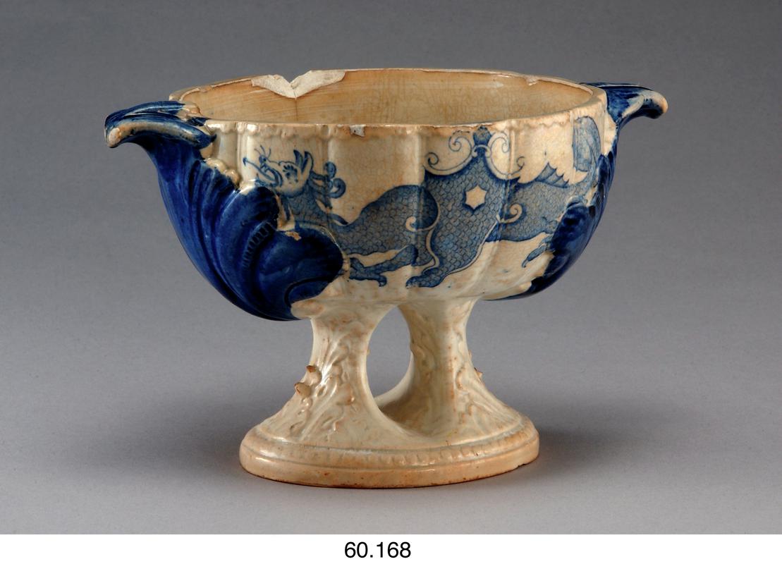 Bowl, earthenware, decorated in blue with dragon & lotus design
