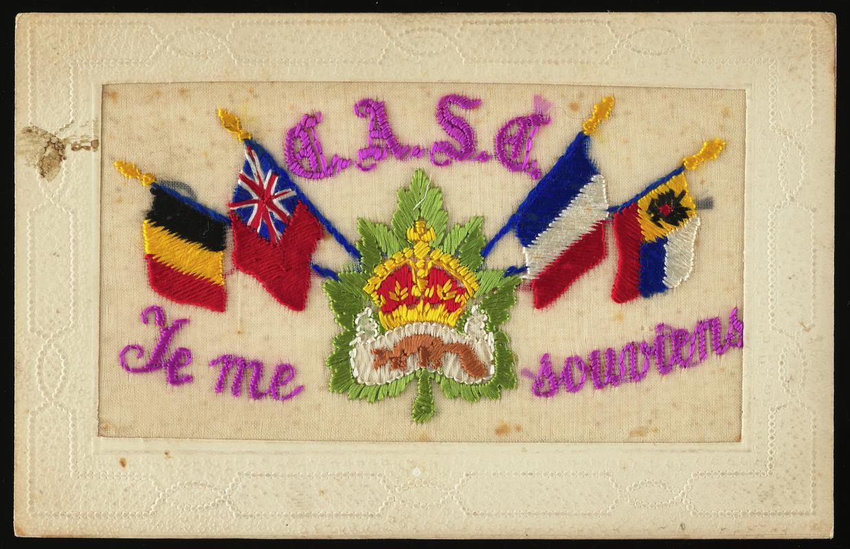 Embroidered postcard inscribed 'E.A.S.E. Te me Souviens'. Handwritten message on back. Sent to Miss Evelyn Hussey, from her brother Corporal Hector Hussey of the Royal Welch Fusiliers, during the First World War.