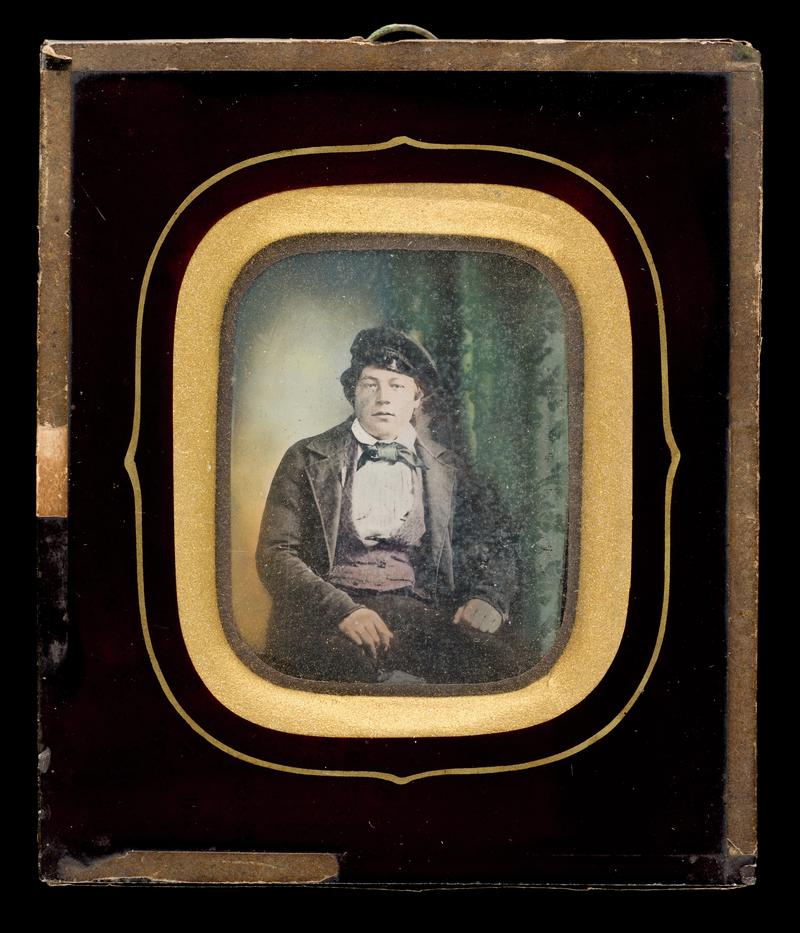 Portrait of a boy in a fisherman's hat with frame