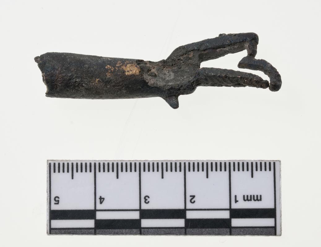 Early Medieval copper alloy horn terminal