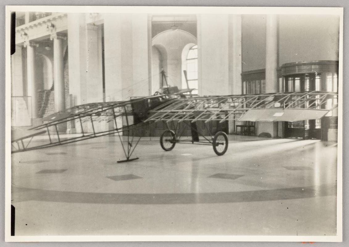 View of Watkins aeroplane standing on the floor of the main hall of the National Museum of Wales.