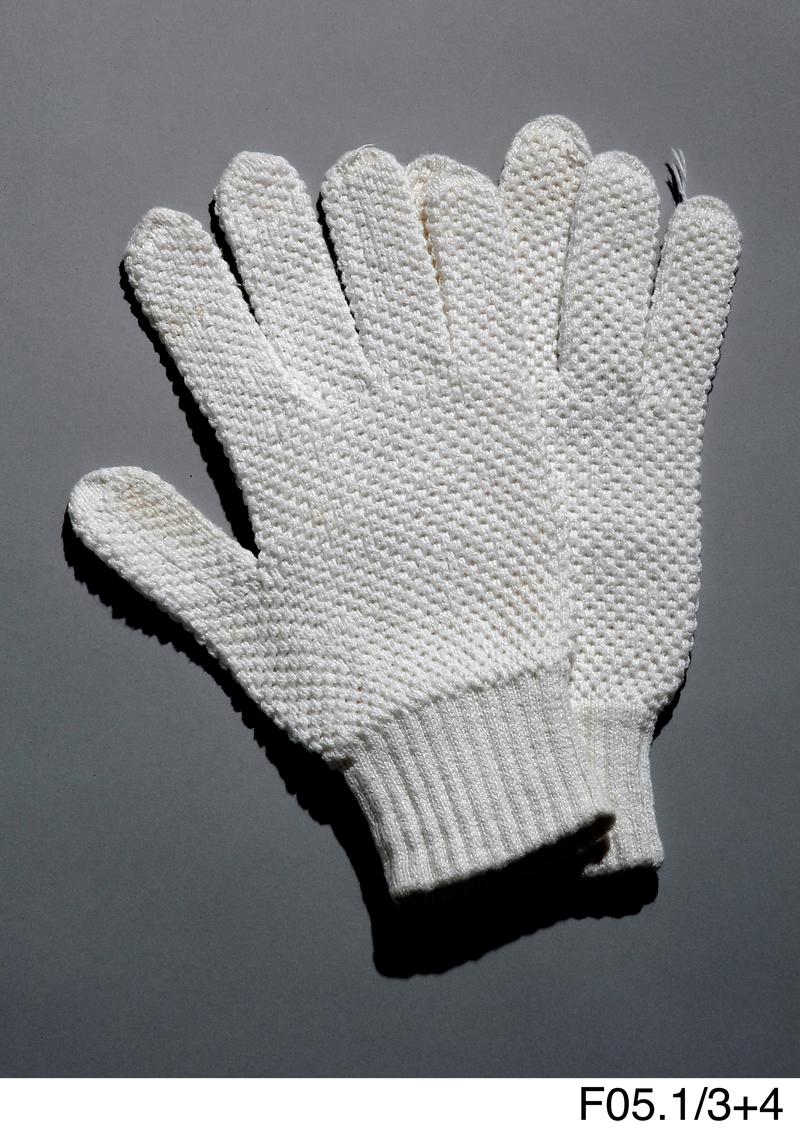 Pair of white knitted men's gloves