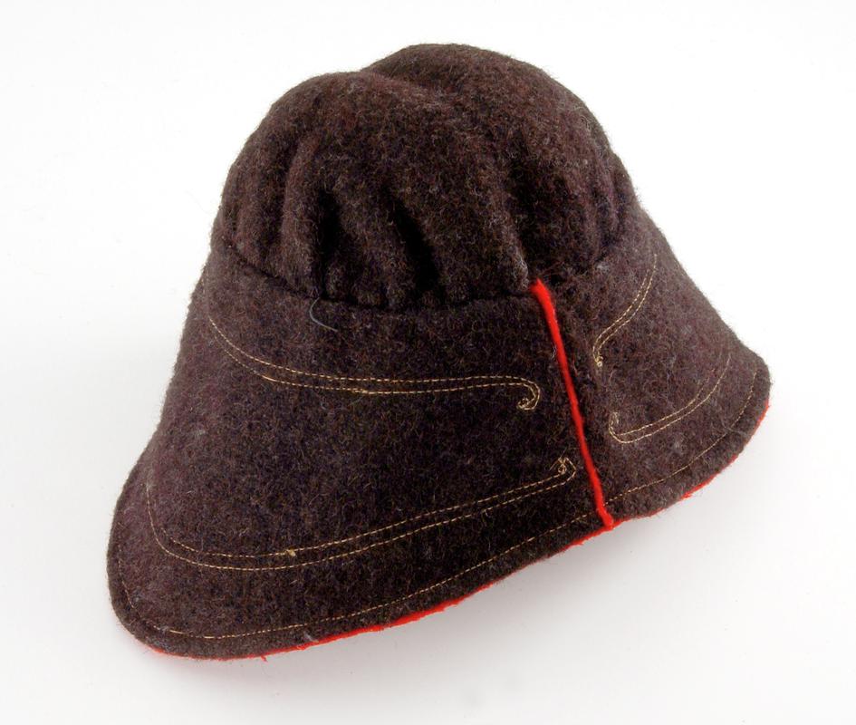 Woollen cap - acquired by the Welsh Presbyterian Mission in India.  (On loan from:  Bwrdd Genhadaeth Dramor / Foreign Missionary Board - permission required before use.)