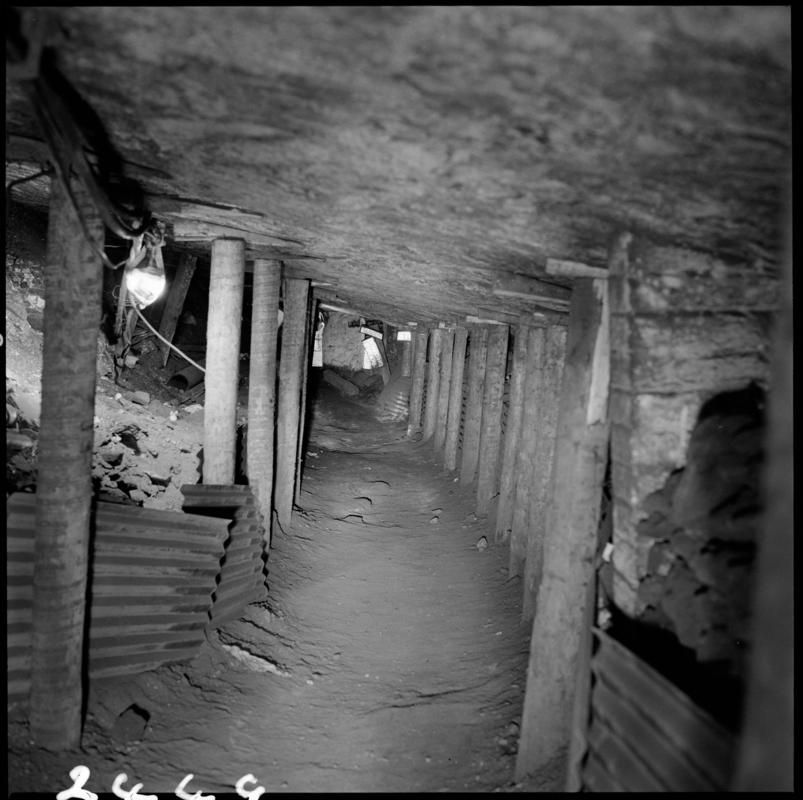 Black and white film negative showing a timbered face, Morlais Colliery.  'Morlais' is transcribed from original negative bag.