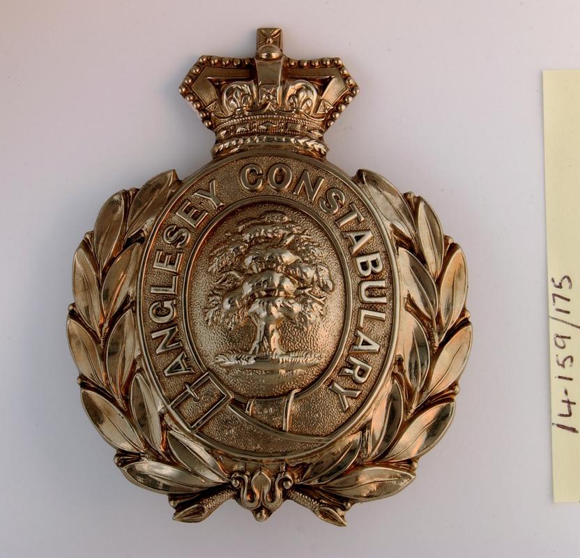 police helmet plate, Anglesey Constabulary
