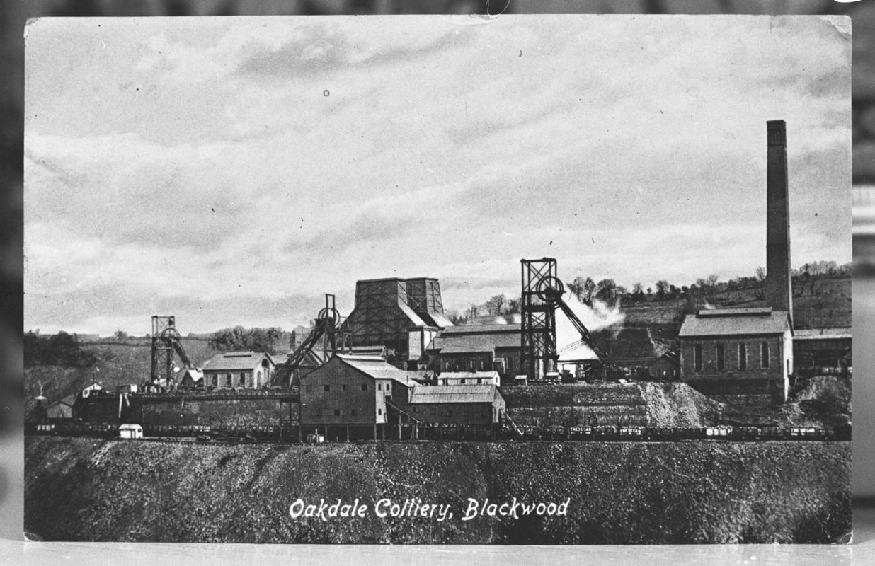 Black and white film negative of a photograph showing a general surface view of Oakdale Colliery.  'Oakdale' is transcribed from original negative bag.