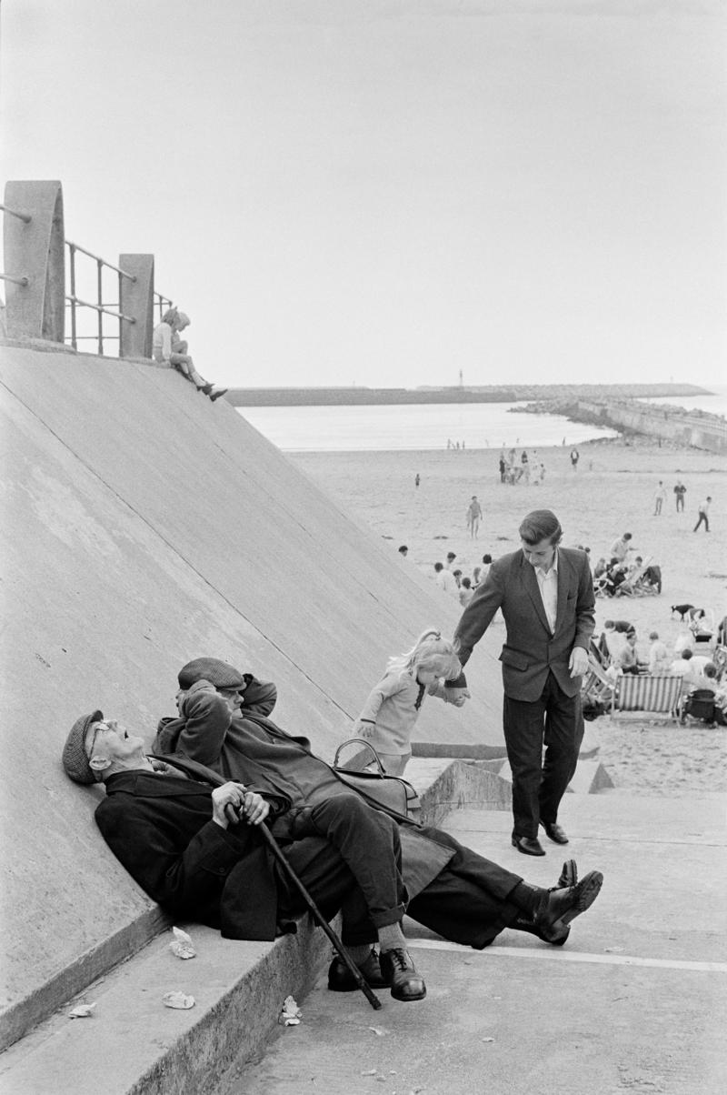 GB. WALES. Aberavon. Elderly sunbathing just away from the beach at Aberavon. 1971