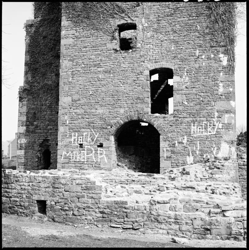 Black and white film negative showing the remains of the engine house with graffiti, Scott's Pit, Llansamlet. 'Scotts Pit' is transcribed from original negative bag.