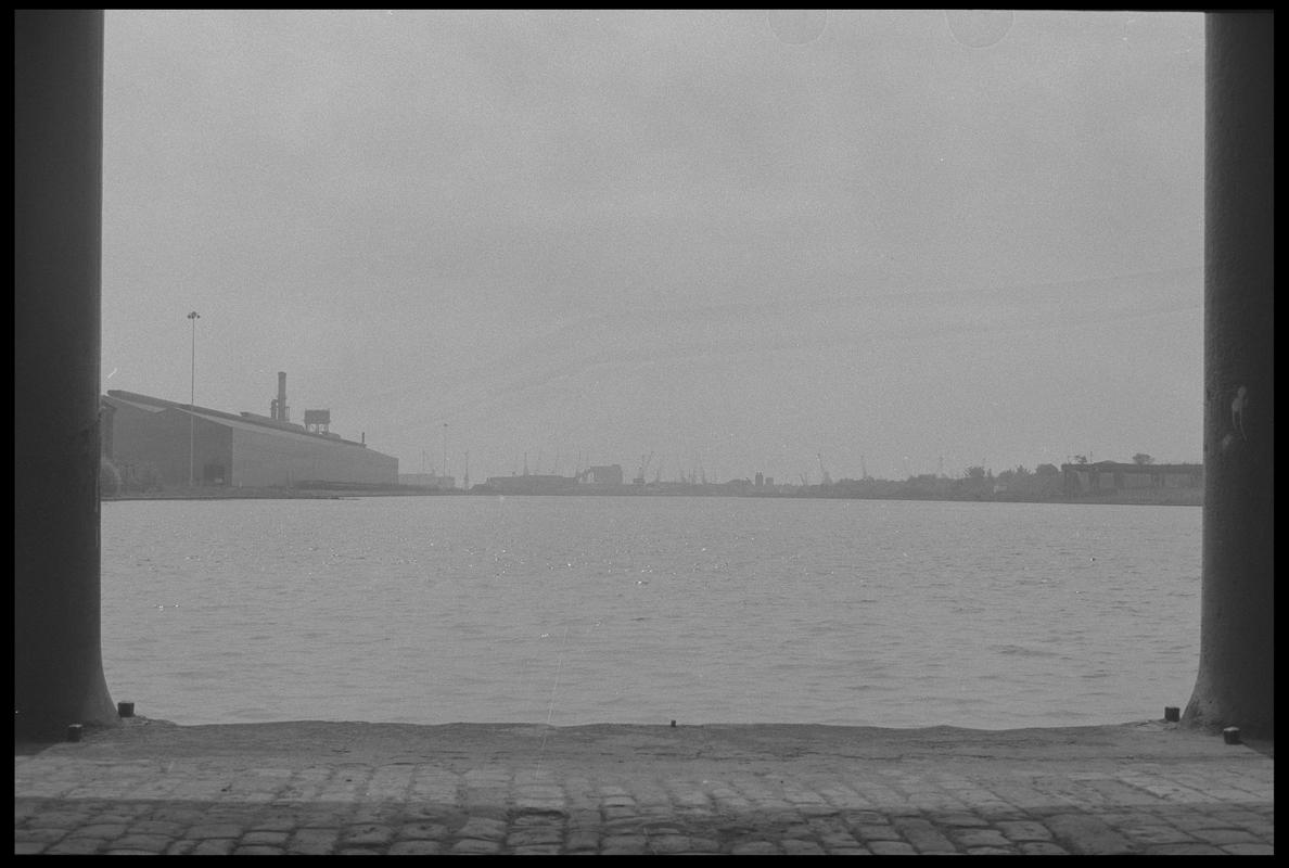 Bute East Dock from between pillars of old warehouse.