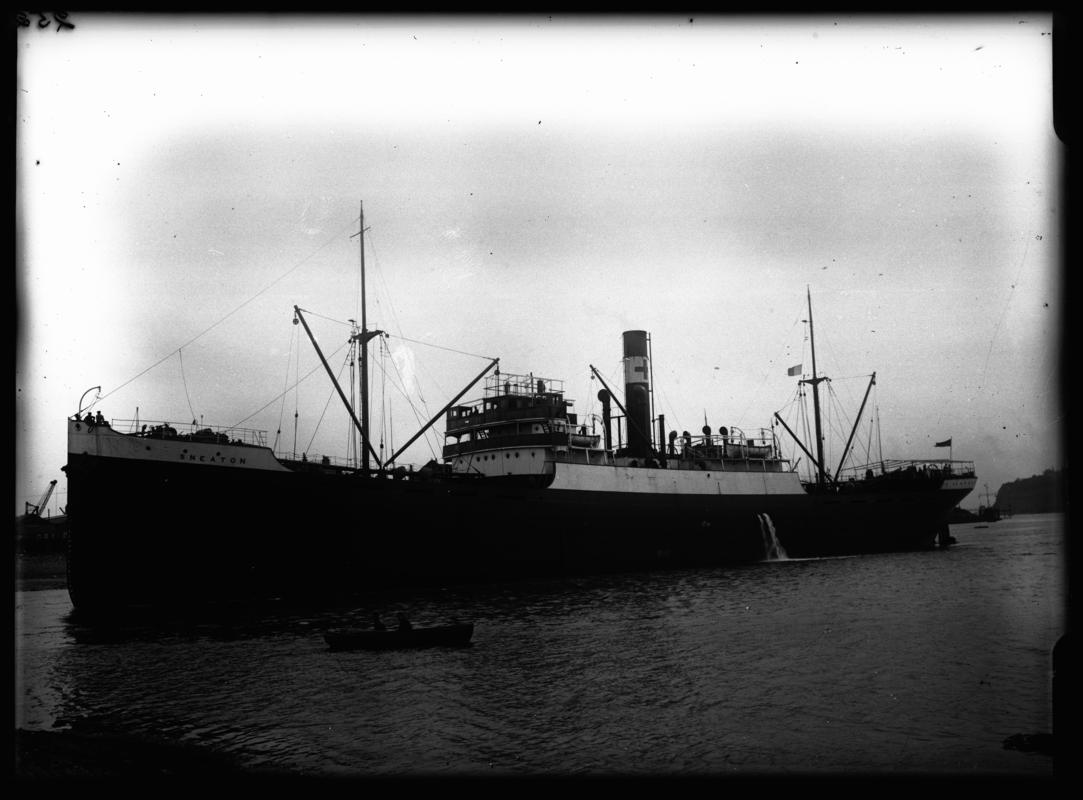 Port broadside view of S.S. SNEATON and waterman's boat at Penarth Head, c.1936.