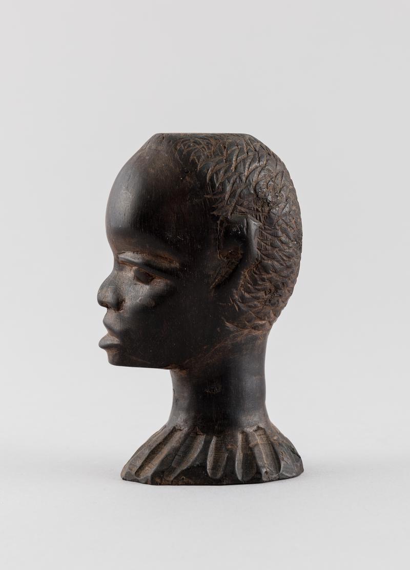 Carved ebony male head (Musa) from Northern Nigeria.