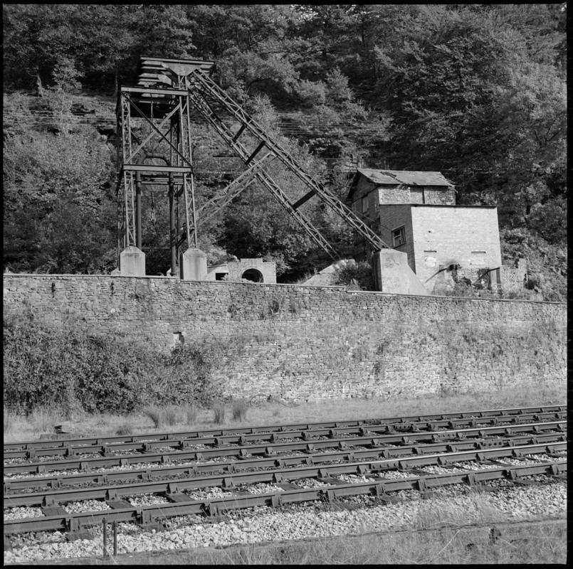 Black and white film negative showing the small lattice headframe on the House Coal Shaft, 1975.