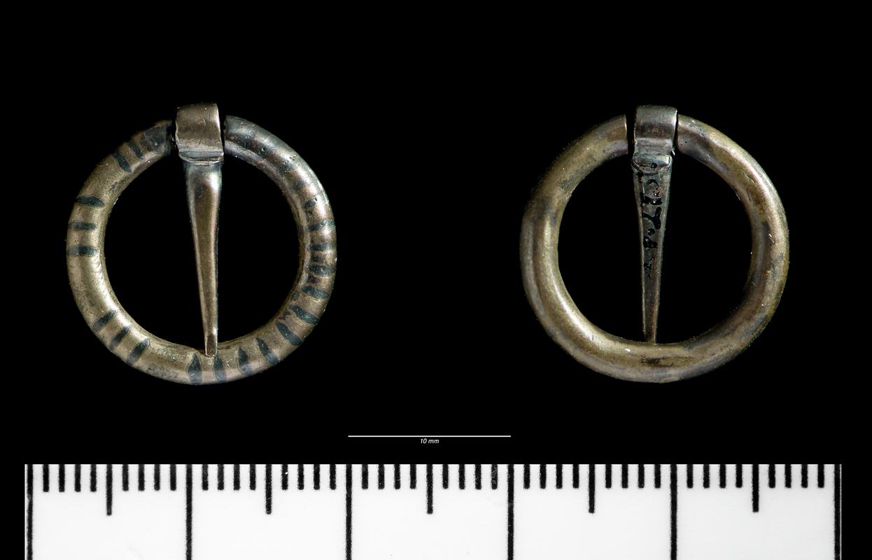 silver annular brooch