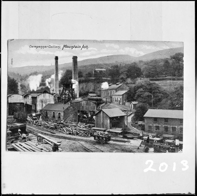 Black and white film negative of a postcard showing a general surface view of Cwmpennar Colliery, Mountain Ash.  'Cwmpennar Mountain Ash' is transcribed from original negative bag.