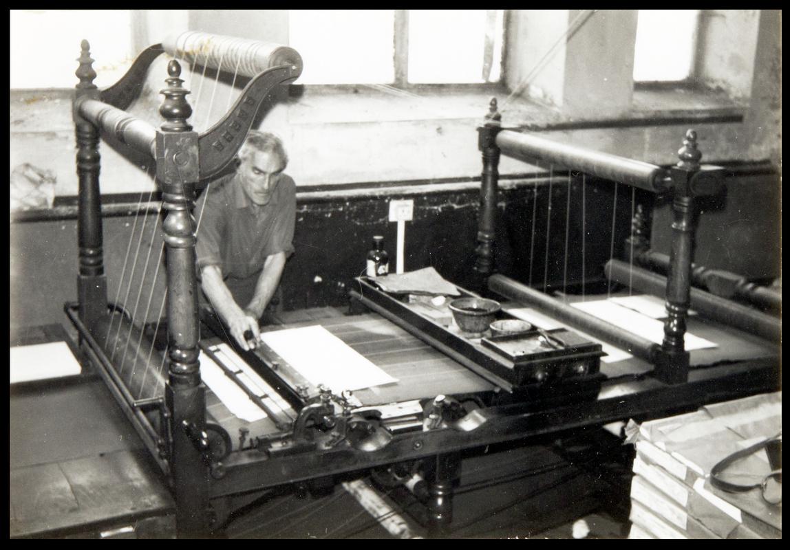 Ruling machine in use at R.E. Jones & Bros. Ltd.