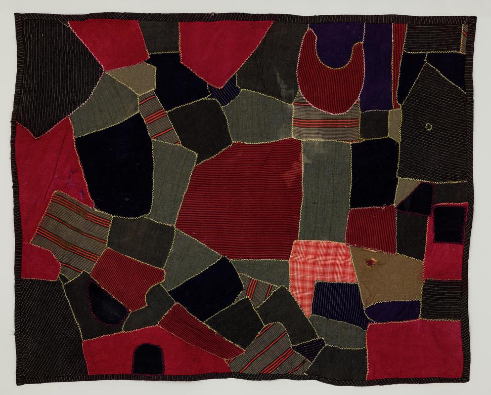 Crazy patchwork quilt made from off-cuts of woollen cloths from Beulah Mill, Brecknockshire, 1880s.