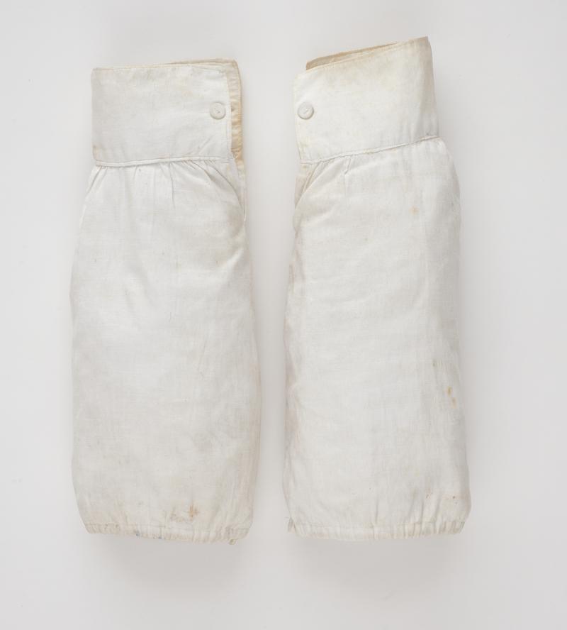 Two pairs of white linen sleeves
