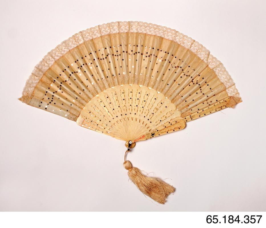 White fan with bone sticks and guards