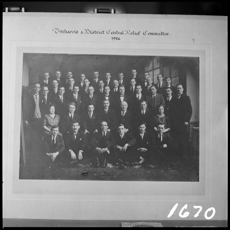 Black and white film negative showing a photograph of Treharris & District Central Relief Committee, 1926.