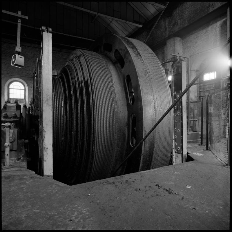 Black and white film negative showing the drum of the Trefor winding engine, Lewis Merthyr Colliery.  'Lewis Merthyr' is transcribed from original negative bag.