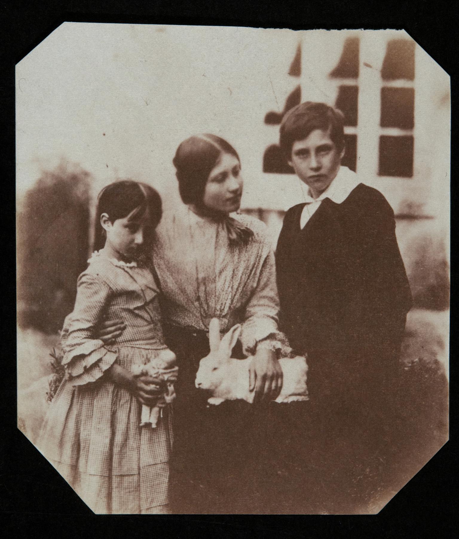 William, Thereza and Lucy with rabbit, photograph
