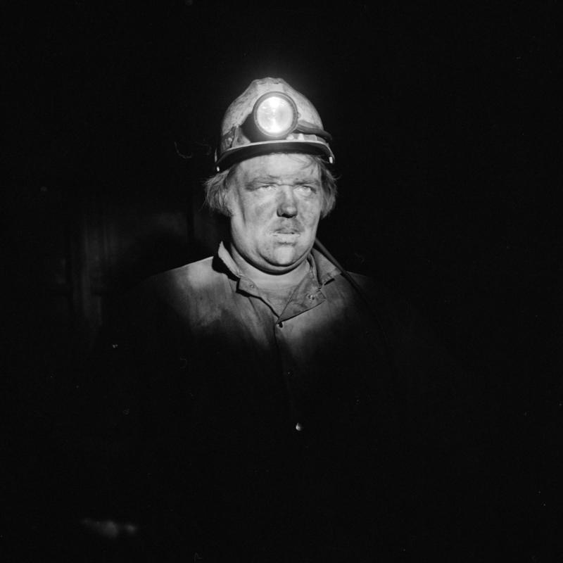Black and white film negative showing a miner, Blaengwrach Mine, 1 November 1979.  'Blaengwrach 1 Nov 1979' is transcribed from original negative bag.  Appears to be identical to 2009.3/1341, 2009.3/1342, 2009.3/1343 and 2009.3/1345.