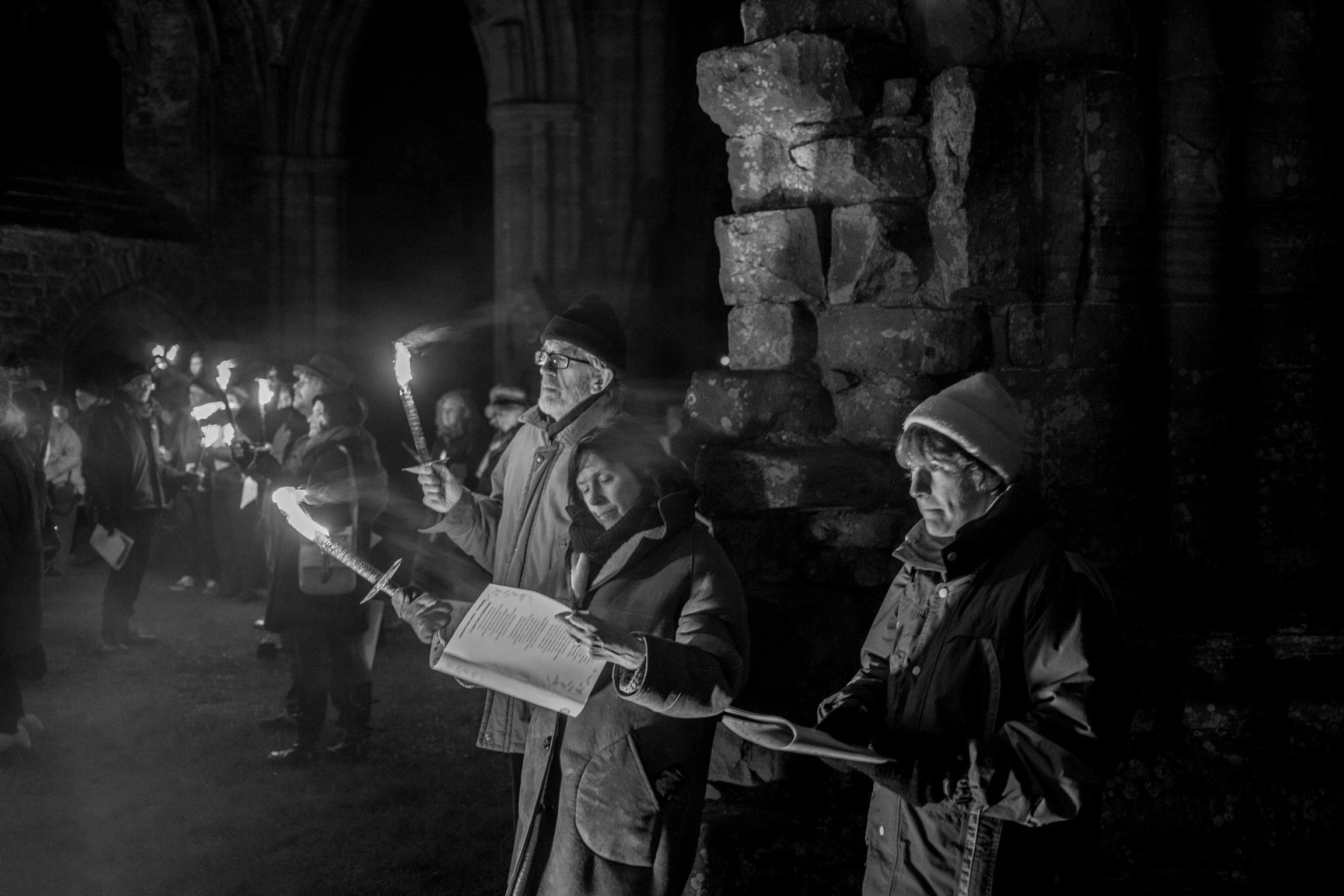 Torch Light Carol Service at Tintern Abbey with Martin Singers. Tintern, Wales