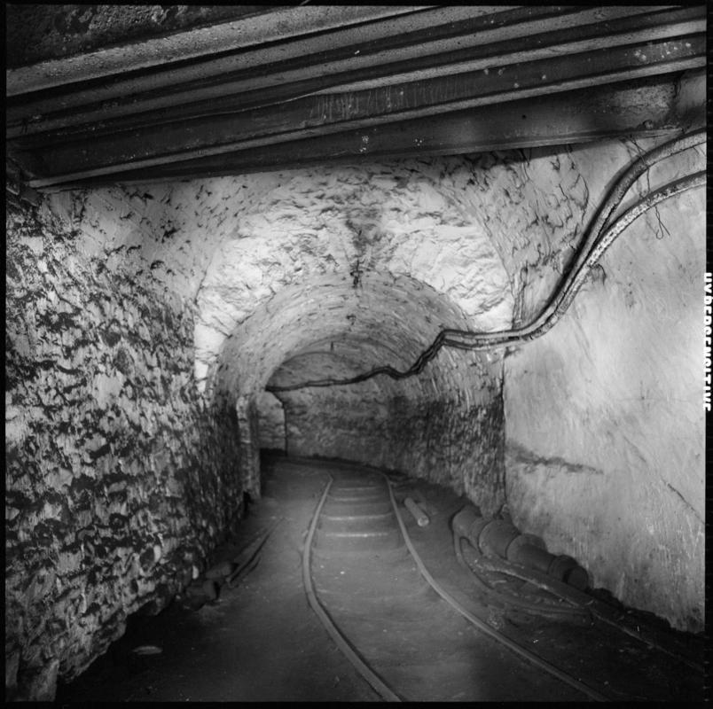 Black and white film negative showing an underground roadway, Wyndham Western Colliery.