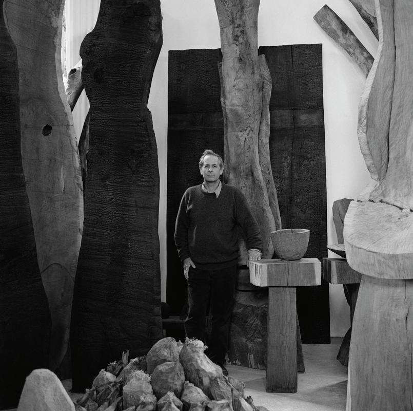 David Nash. Photo shot: Capel Rhiw, Blaenaue Ffestiniog, 31st May 2002. Place and date of birth: Esher, Surrey 1945. Main occupation: Sculptor. First language: English. Other language: Wood. Lived in Wales: Over 30 years.