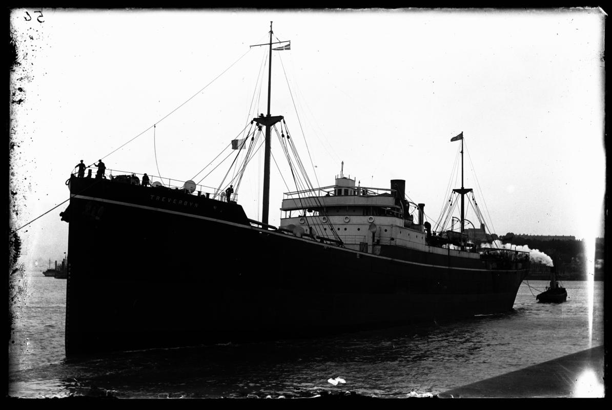 Bow view of S.S. TREVERBYN with tug at Penarth Head, c.1936.