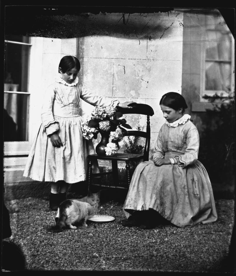 Two young girls (probably Lucy & ?) with cat Peeps