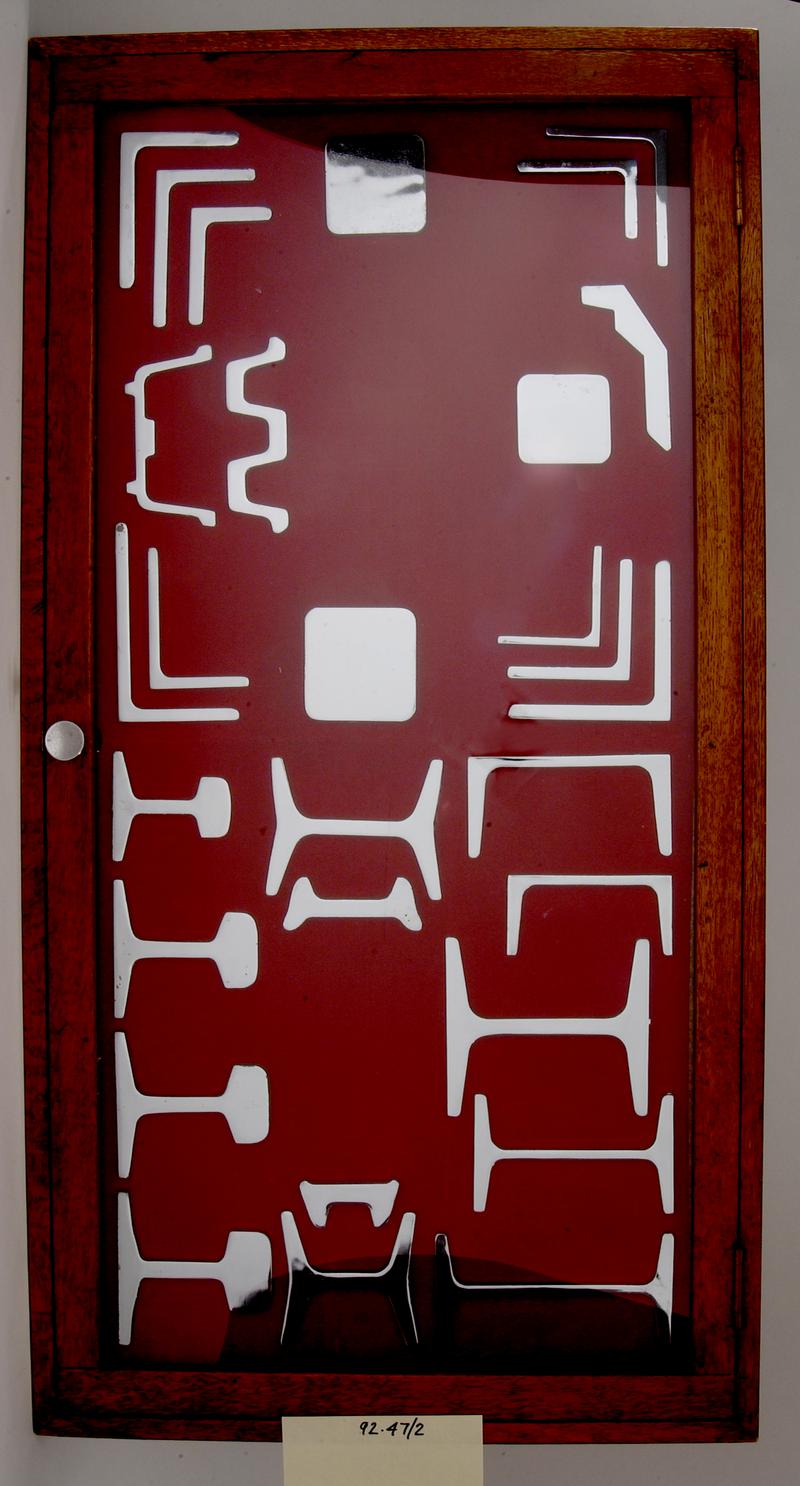 Rolled steel sections, mounted in display case